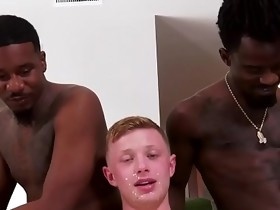 Ginger dude getting tag teamed by big cocked muscular black guys