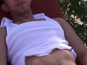 Good looking Asian twink wanks it by the pool and teases